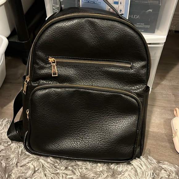 Backpack black with gold accents - Picture 1 of 8